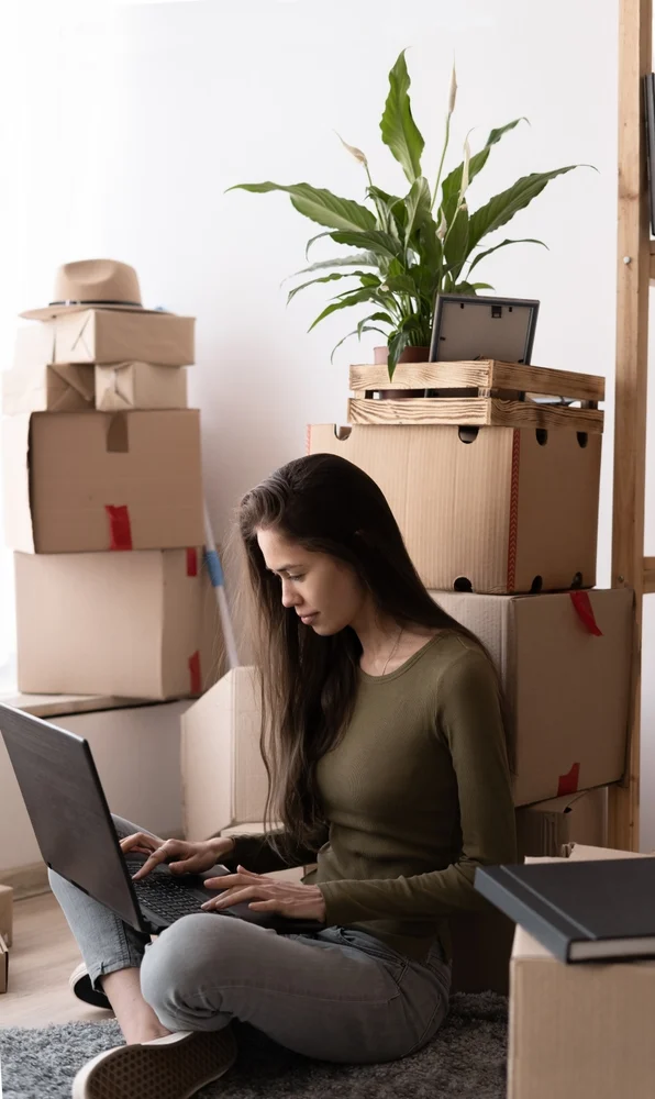 A woman reviewing details of a home mortgage from Spring EQ